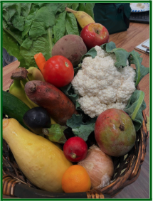 Basket filled with fresh fruit and vegetables